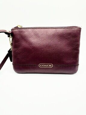 COACH Burgundy Leather Wristlet with Gold Hardware